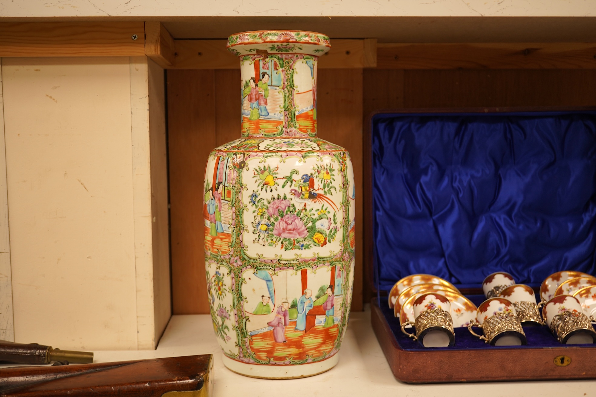 A 19th century Chinese famille rose baluster vase enamelled with flowers and figures, 44cm high
